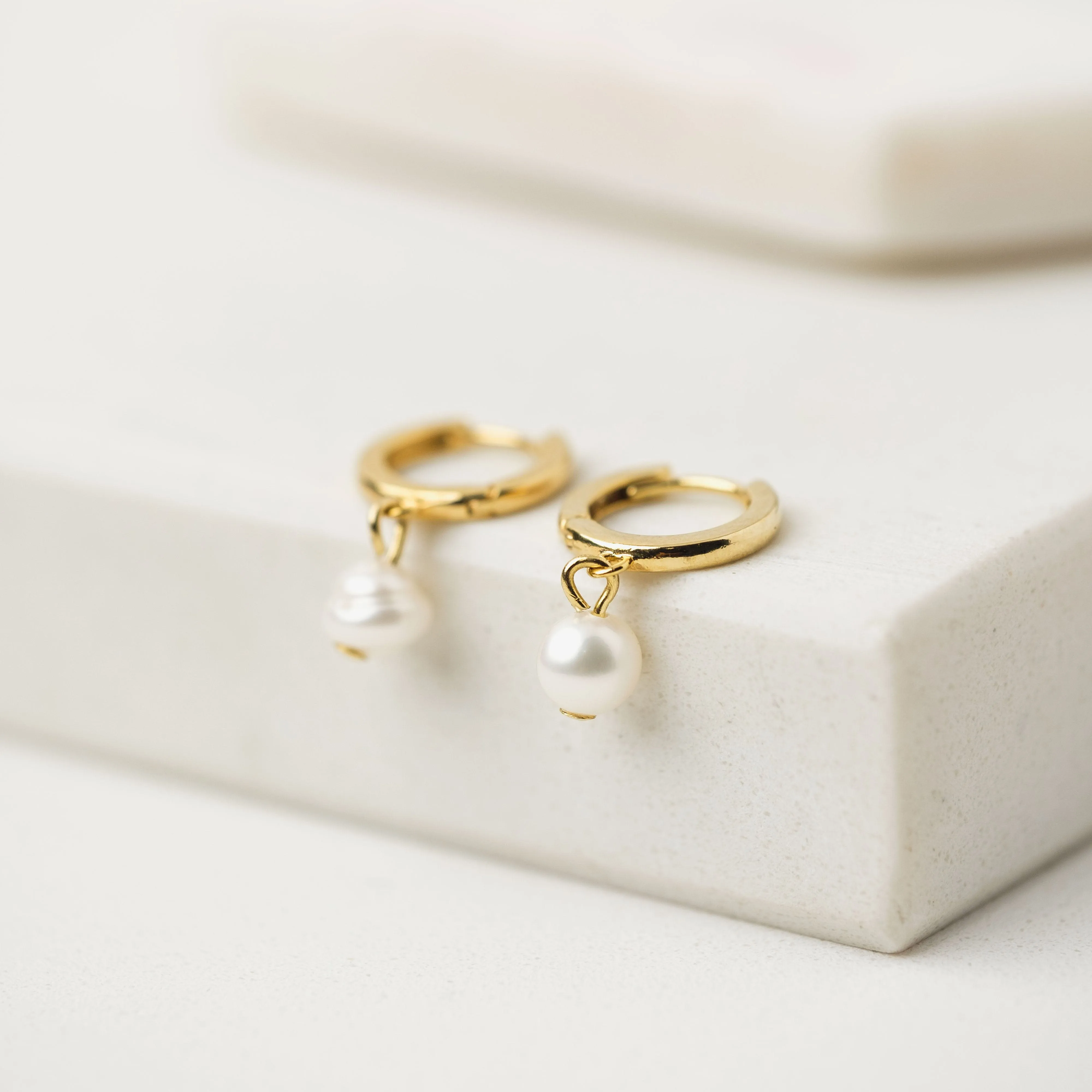 Amari Pearl Huggie Hoop Earrings