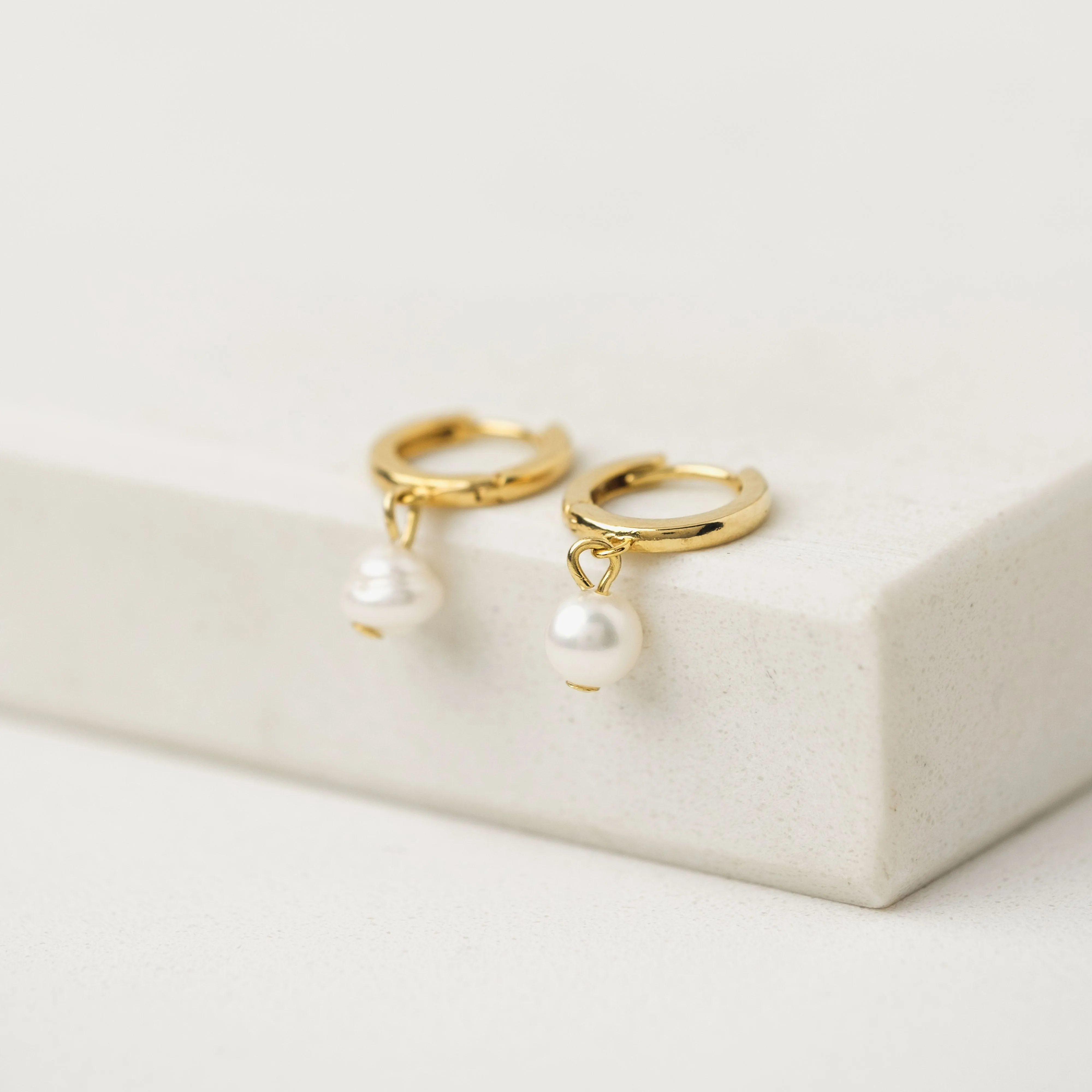 Amari Pearl Huggie Hoop Earrings