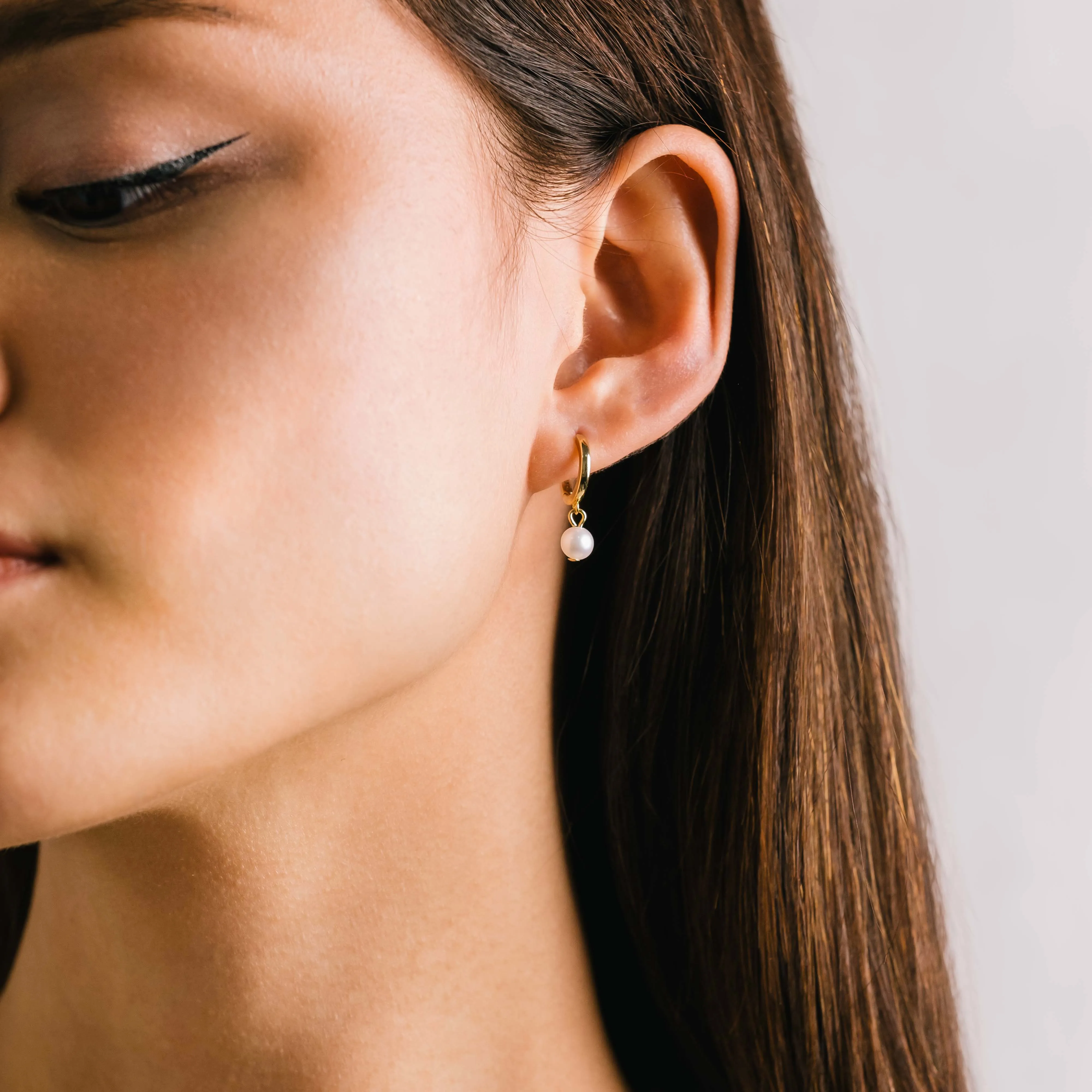 Amari Pearl Huggie Hoop Earrings