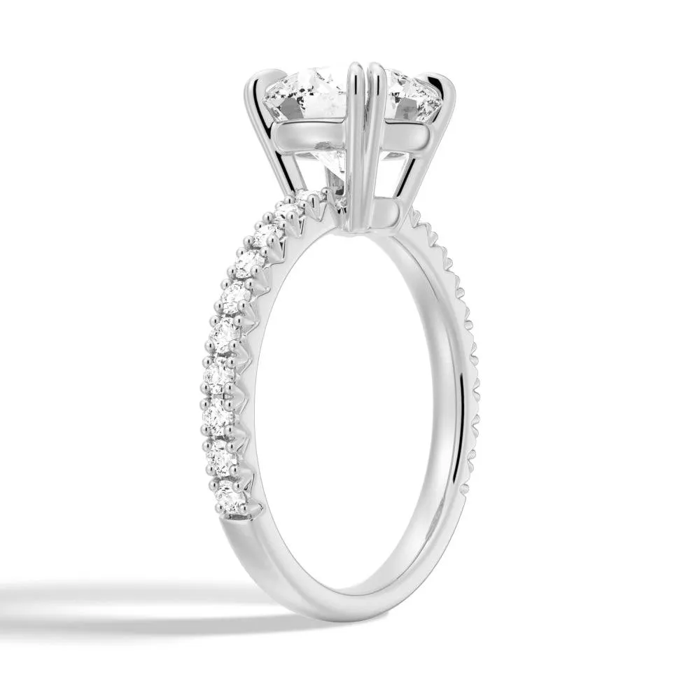 Solitaire Round Cut Engagement Ring With Pavé Accents